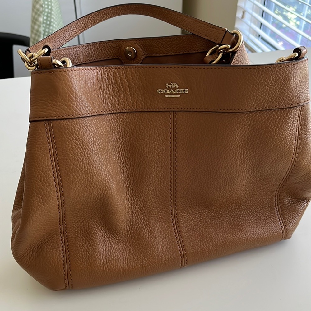 Coach British tan pebble leather purse.